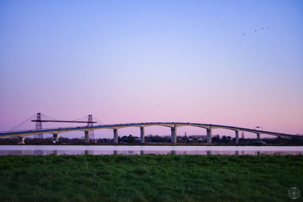 pont Transbordeur et Viaduc du Martrou au loin, lagunes de la station de lagunage de Rochefort au premier plan